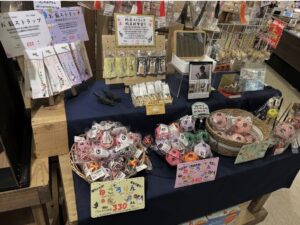 納品