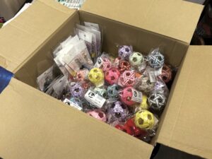 納品
