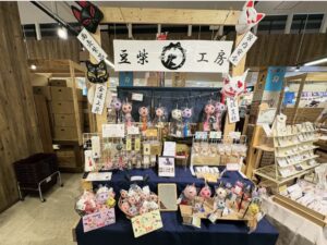 納品